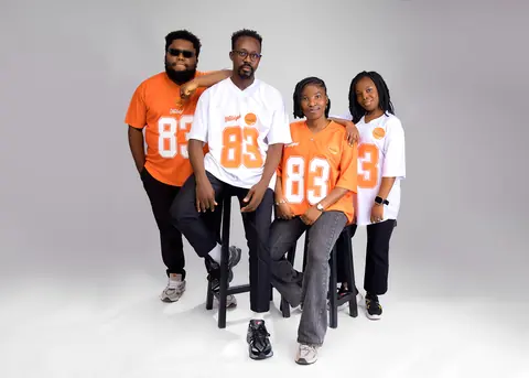 Four models in Aṣọ Ìgbàlódé jerseys