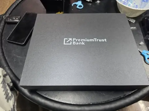 A branded presentation box produced for PremiumTrust Bank